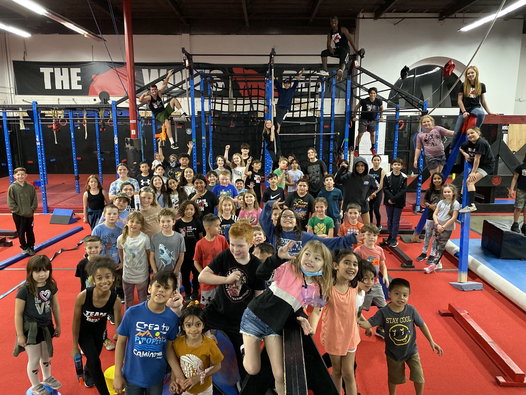 Kids doing ninja obstacles at The Wolf’s Den